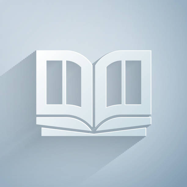 istock Paper cut Holy bible book icon isolated on grey background. Paper art style. Vector Illustration 1214656434