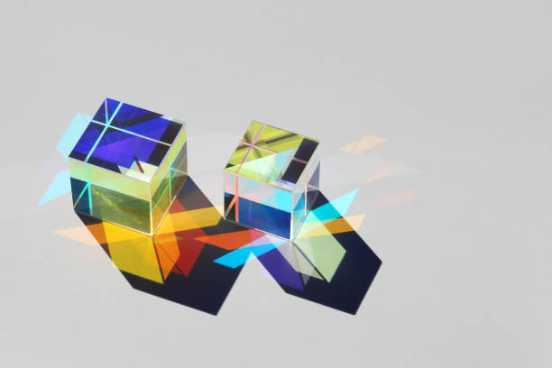 istock Falling shadow of two glass cubes with many colored rays 1214656562