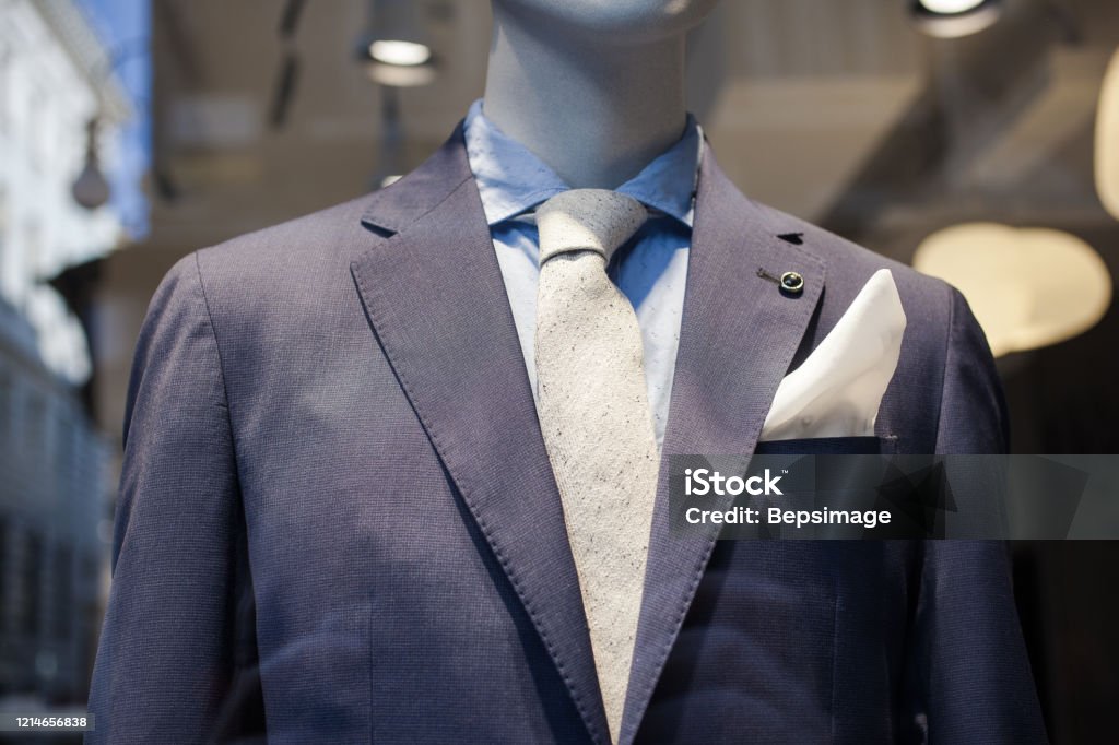 Business male suit on shop mannequine Business male suit on shop mannequins high fashion retail display Italy Stock Photo