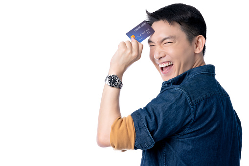 business communication ideas concept with asian attractive male casual tshirt hand credit card smartphone smile and happiness hand gesture pose present point show joyful moment