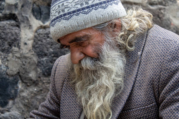 istock Portrait of an old man whose hair is mixed with beard 1214659800