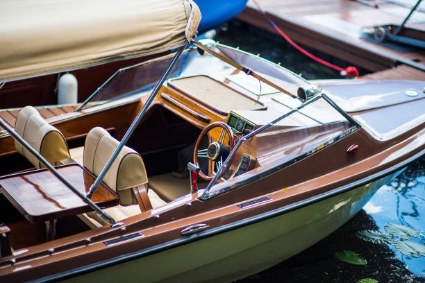 istock Small motor boat at anchor by rope in Replot pier 1214661068