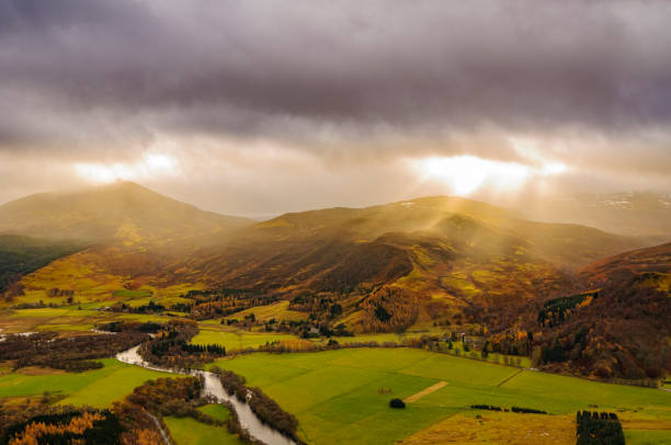 View over Loch Rannoch in the Scottish Highlands during a cloudy winter day in Scotland stock photo