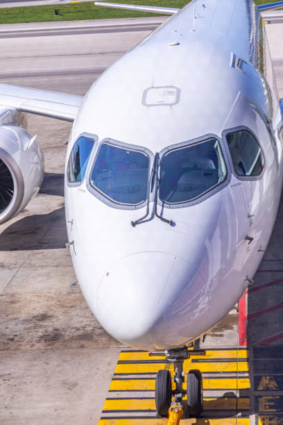istock neutral aircraft with cockpit view at the gate 1214662806
