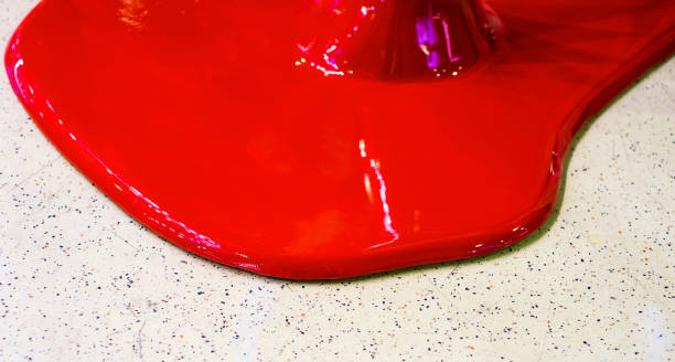 istock Bloody red paint spilled on cream coloured carpet 1214666083
