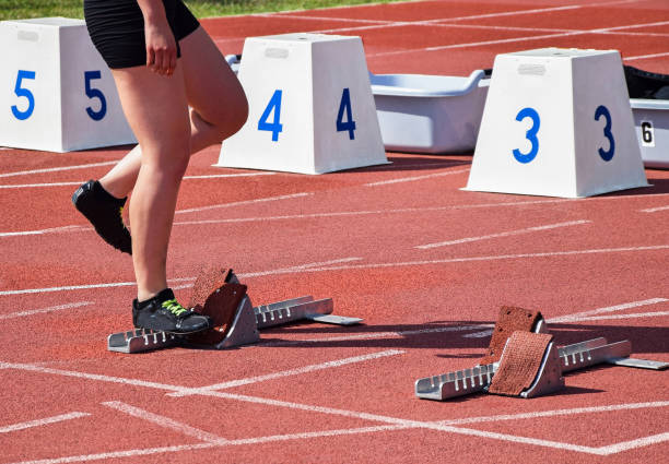 istock Starting line of the running race track 1214667183