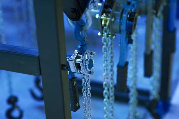 Hooks of a two-chain chain lanyard on the background of a production room. stock photo