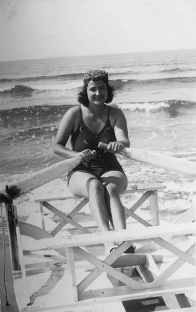 1920s young woman portrait at the beach, italy. - young women 20s people one person imagens e fotografias de stock