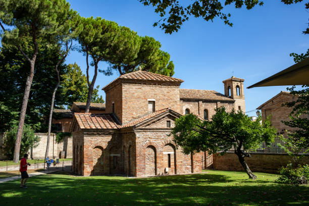The Mausoleum of Galla Placida in Ravenna, Italy. Ravenna, Italy - Sept 11, 2019: The Mausoleum of Galla Placida in Ravenna, Italy. Small chapel with colorful Byzantine mosaics - one of the UNESCO world heritage site. mausoleum photos stock pictures, royalty-free photos & images