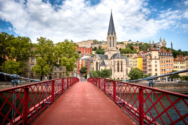 Lyon, Eglise Saint George seen from the Passerelle St. George (Walkways). France. The Old City is the historic heart of Lyon, the largest Renaissance district in Europe. On the peninsula (Presqu'ile) formed over the centuries between the Rhone and the Saone winding alleys, squares, secret passages (Traboules) three large churches (St Jean, San Paolo and San Giorgio), old artisan shops. basilica photos stock pictures, royalty-free photos & images