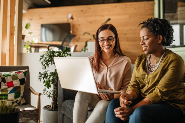 istock Two Female Entrepreneurs Using Laptop, Working on New Project 1214676517