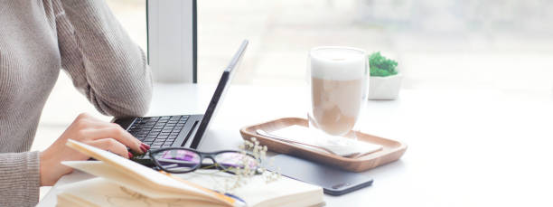 Banner for the site with a working girl at the computer.