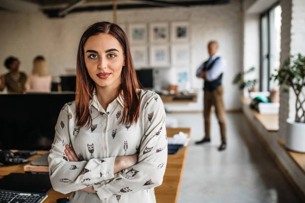 istock Portrait of satisfied manager in creative office 1214677076
