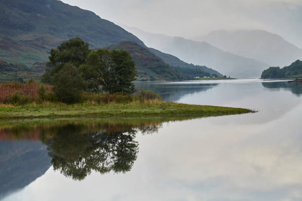 istock Reflections on the lake, (Loch Leven) in the Highlands, Scotland. 1214678377