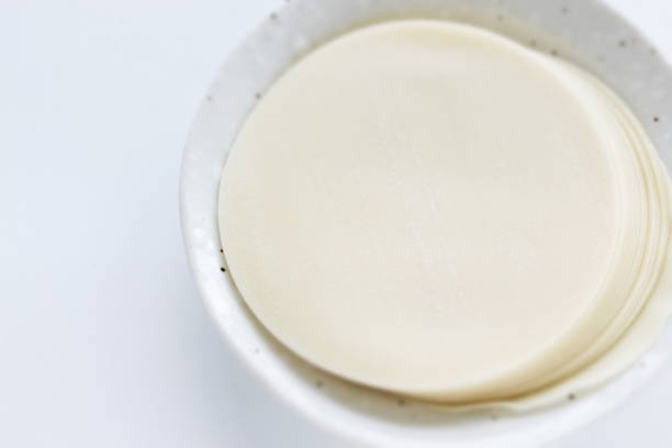 istock Chinese dumpling dough skin on dish 1214681326