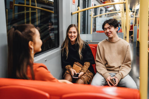 istock Teenagers in subway train 1214682836