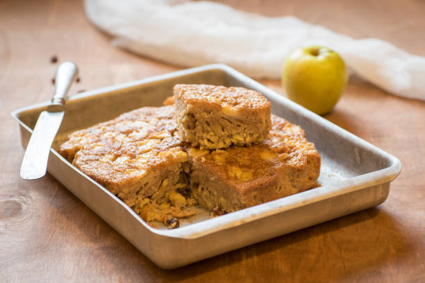 istock Apple sponge cake, walnuts, flour, sugar, oil and raisins 1214684708