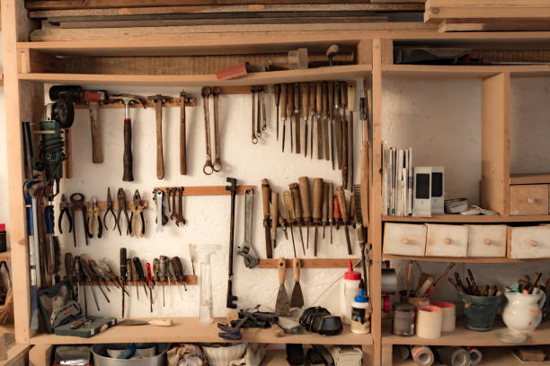 istock Various carpenter's tools and supplies in a garage. 1214685138