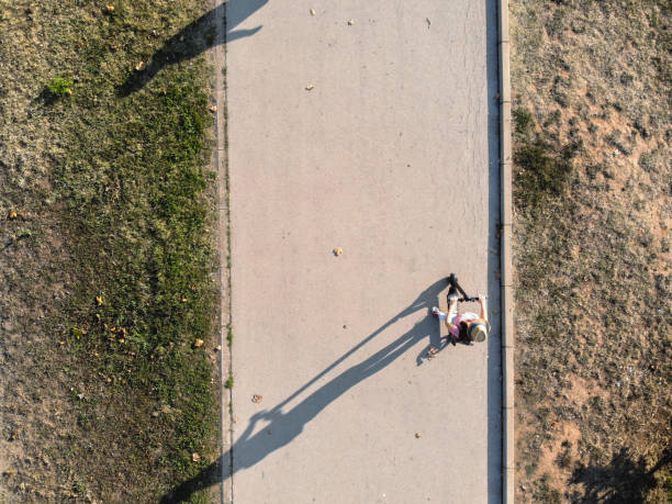 istock Woman driving electric scooter 1214685140