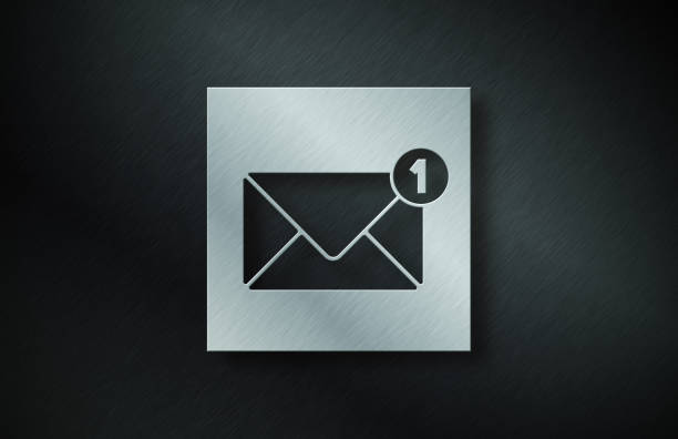 istock Gray Metal Plate With Email Symbol On Dark Metallic Background 1214685351