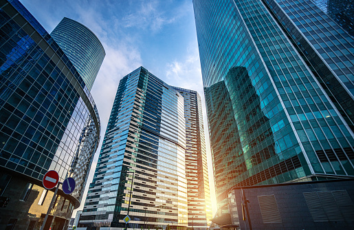 Corporate business buildings against blue sky