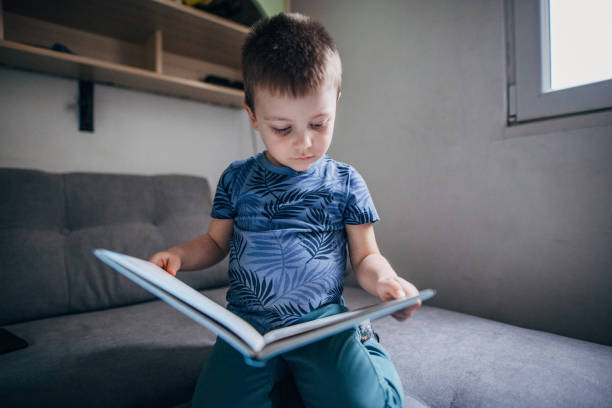 istock One little boy feeling bored in home isolation 1214692823