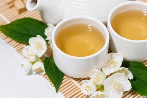istock japanese tea ceremony. green tea with jasmine, top view closeup 1214696558