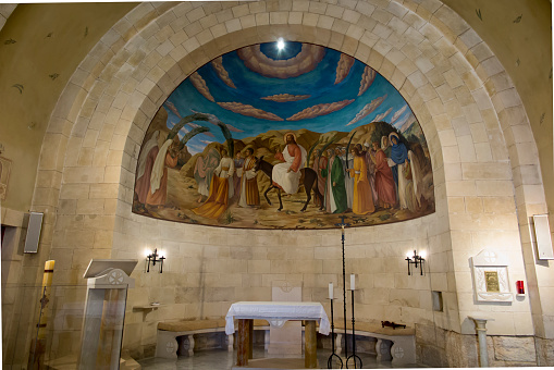 Bethphage, Israel, January 30, 2020: Fresco at Betfage on the Mount of Olives showing the entry of Jesus to Jerusalem, Israel