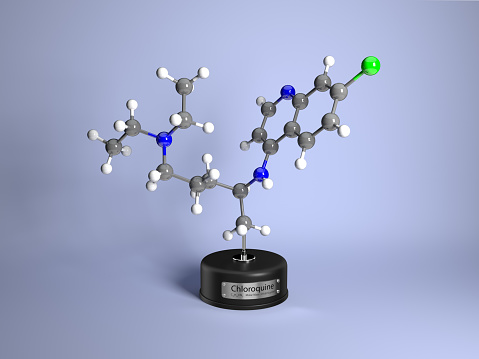 Rendering of the chloroquine molecule on a display plinth, showing the molecular structure. Chloroquine is a drug used to treat malaria and COVID-19 (coronavirus)