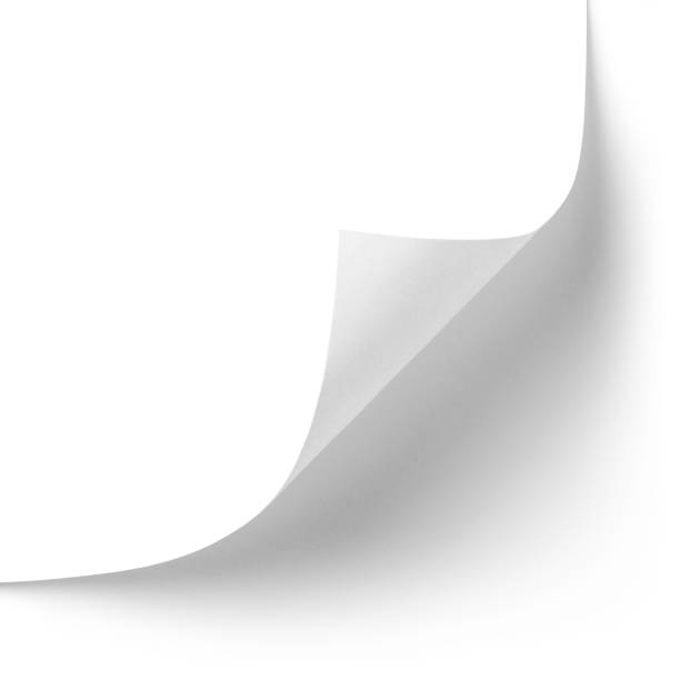 Curved corner of a paper page on white
