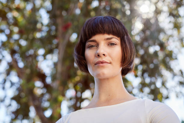 istock Confident young woman standing outside in her yard after exercising 1214700288
