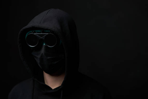 istock Young man wearing face mask and protective glasses. 1214700401