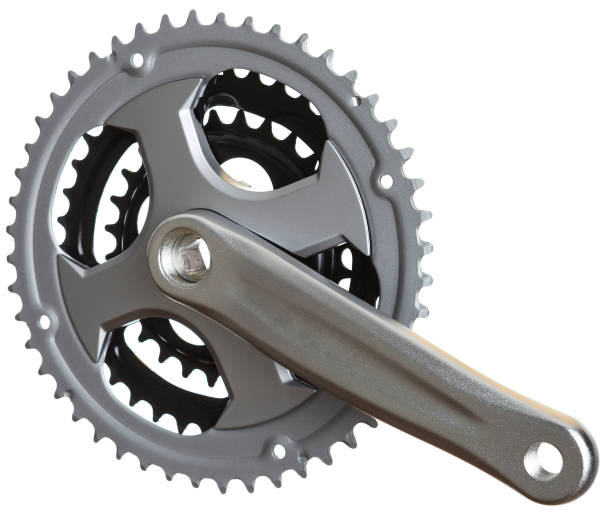 istock Cogwheels and cranks for bicycle pedals on isolated white background 1214701762