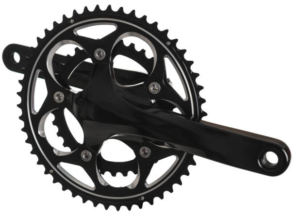 istock Cogwheels and cranks for bicycle pedals on isolated white background 1214701945