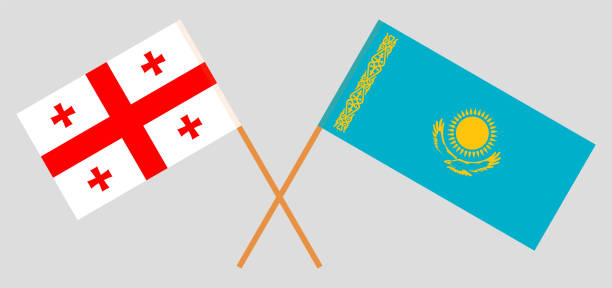 Crossed flags of Kazakhstan and Georgia Crossed flags of Kazakhstan and Georgia. Official colors. Correct proportion. Vector illustration georgia football stock illustrations