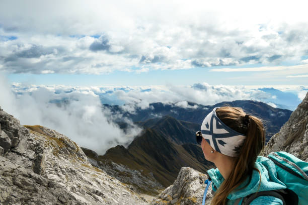 istock High Wait - A girl wandering through Alps 1214702195