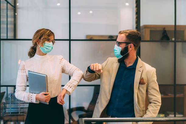 istock Business people greeting during COVID-19 pandemic 1214702841