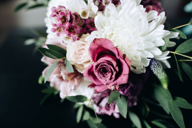 istock Beautiful bouquet for the bride on a dark background 1214703578