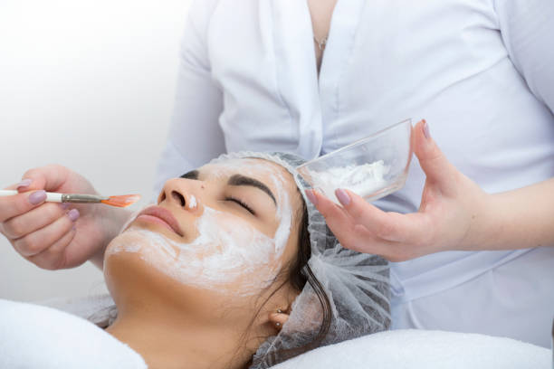 istock girl in a massage parlor spetsialits cosmetology accessibility modernity 1214703805