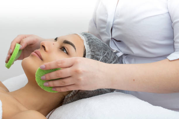 istock girl in a massage parlor spetsialits cosmetology accessibility modernity 1214704169