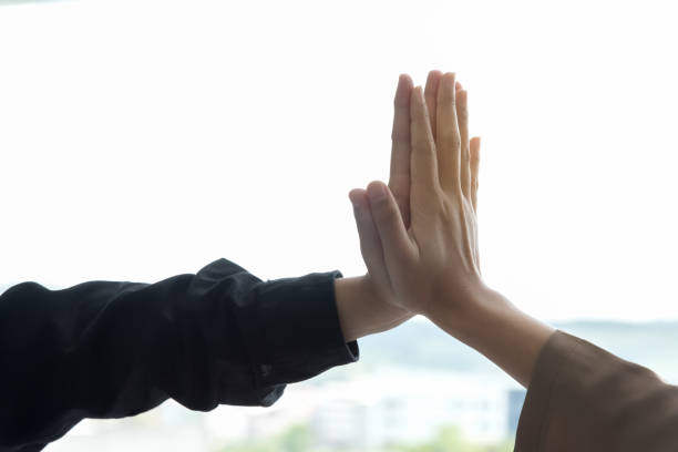 istock Hand hit together,show power of cooperation. 1214705689
