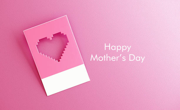 Pixelated cut out heart shape on pink background. Horizontal composition with copy space.