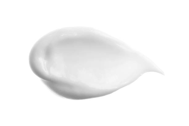 istock Cosmetic body lotion smear. White AA DD cream smudge isolated on white. 1214709465