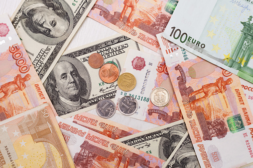 currency paper, banking and finance, saving money. Dollars, euros and rubles. Falling and rising exchange rates