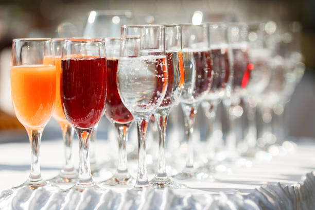 istock Red and yellow juice in tall glasses 1214710816
