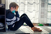 Depressed kid during epidemic quarantine