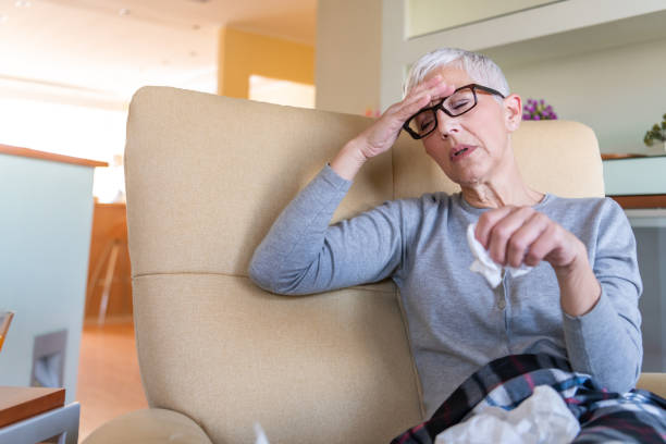 istock Sick mature woman catch cold 1214717371