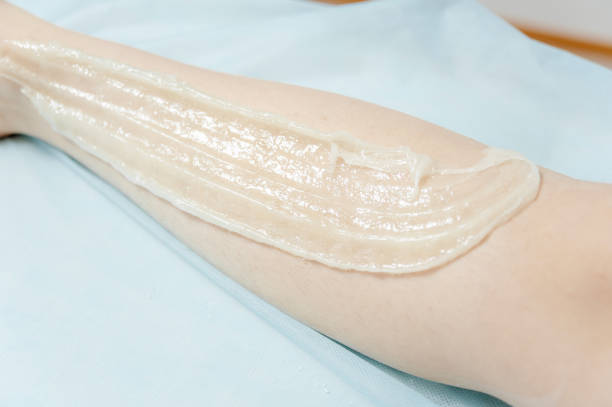 istock Sugaring hair removal. Beauty concept. Sugaring. Epilation process. 1214719270