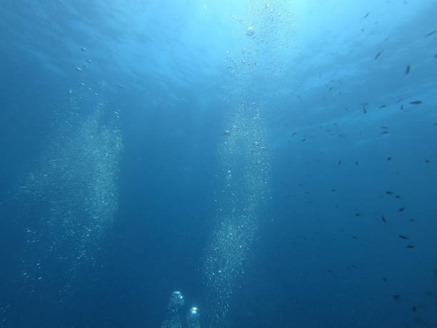 istock Bubble in the Blue Sea Underwater Ambiance 1214721780