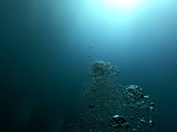 istock Bubble in the Blue Sea Underwater Ambiance, Sun light beams 1214721813